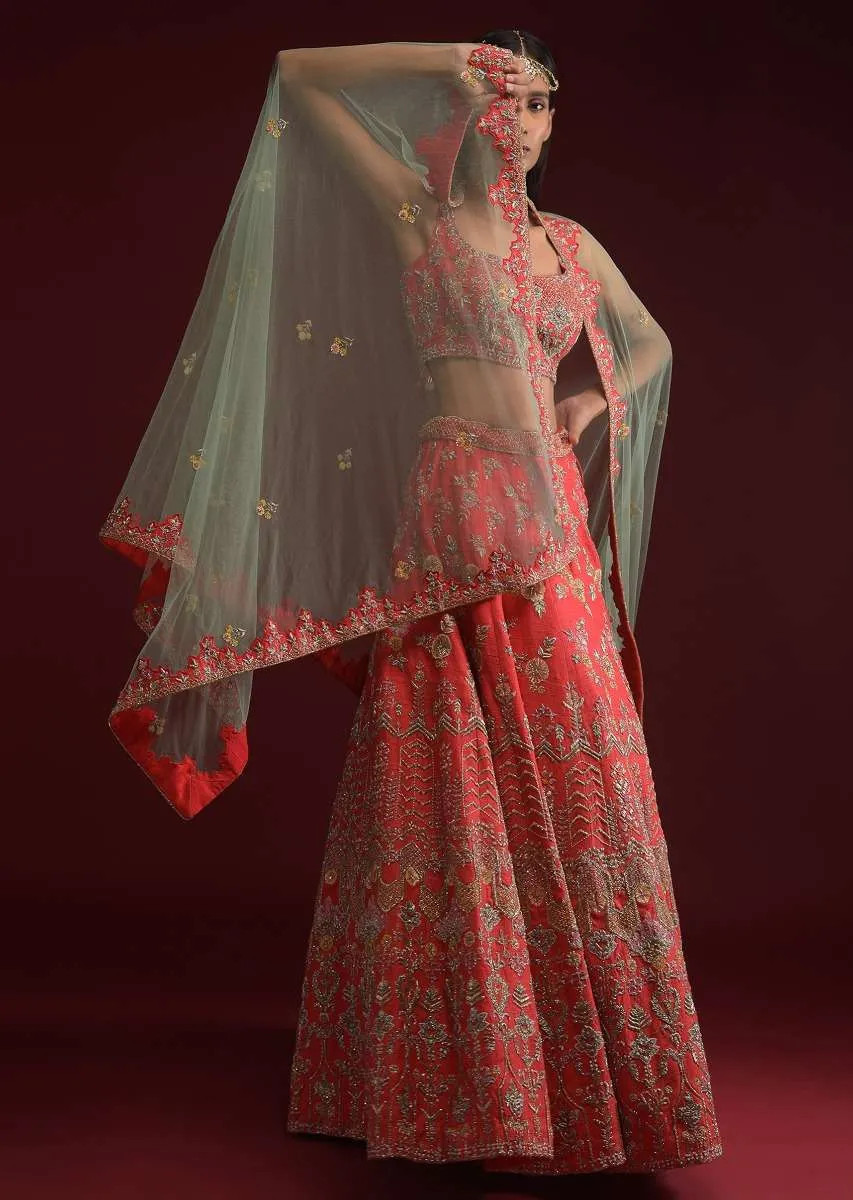 Coral Lehenga Choli In Raw Silk With Hand Embossed Embroidery In Floral And Geometric Motifs Online - Kalki Fashion