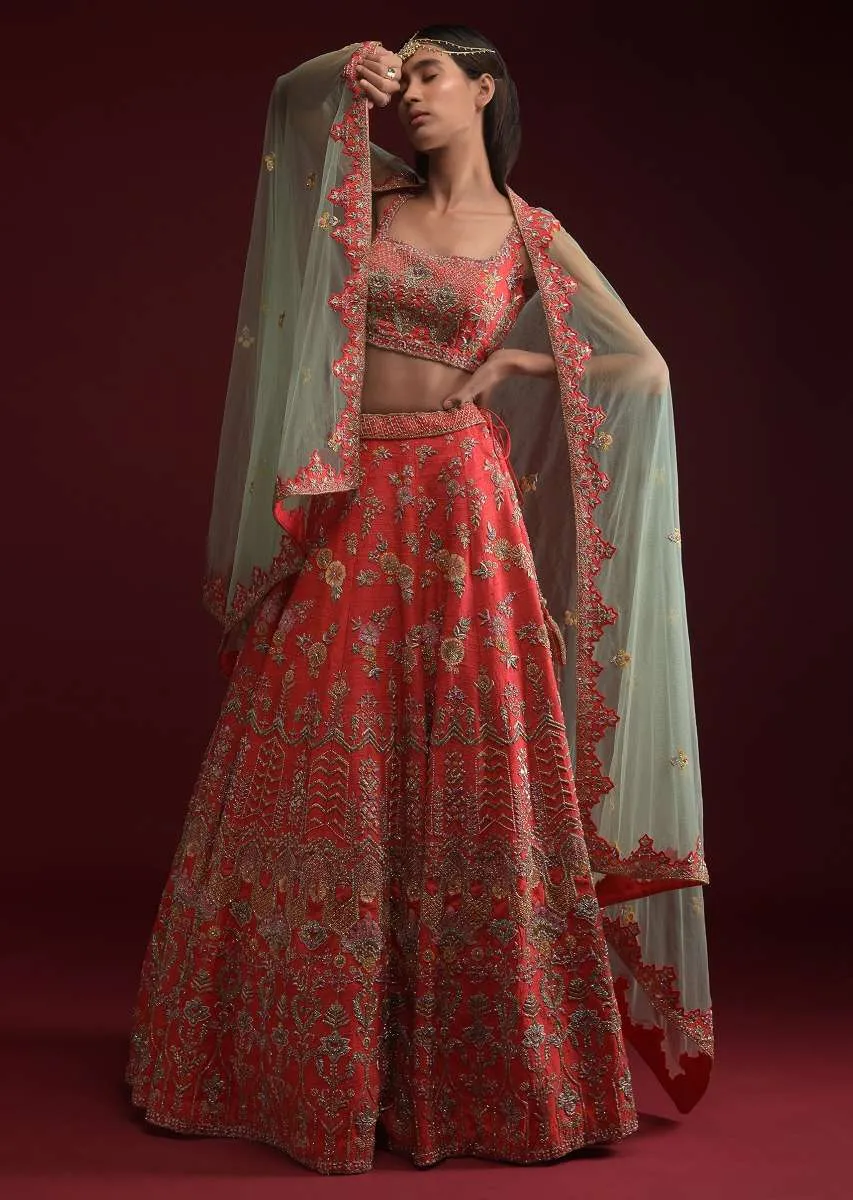 Coral Lehenga Choli In Raw Silk With Hand Embossed Embroidery In Floral And Geometric Motifs Online - Kalki Fashion